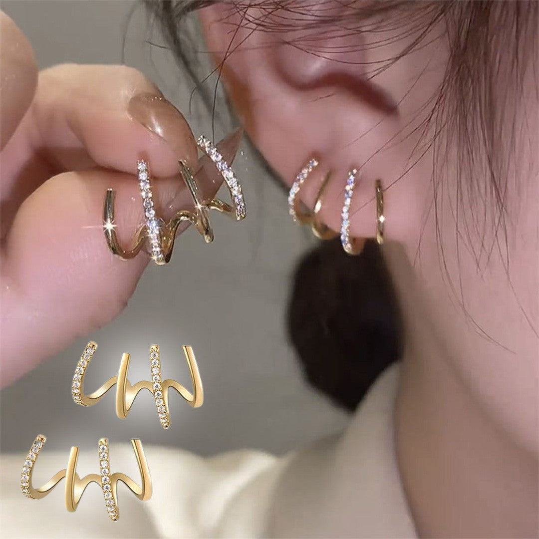 Aretes Claw de Garra: Elegancia y Versatilidad en Cada